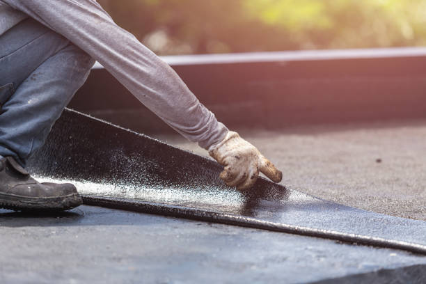 Professional Basement Waterproofing technician working in Bloomingdale, IN